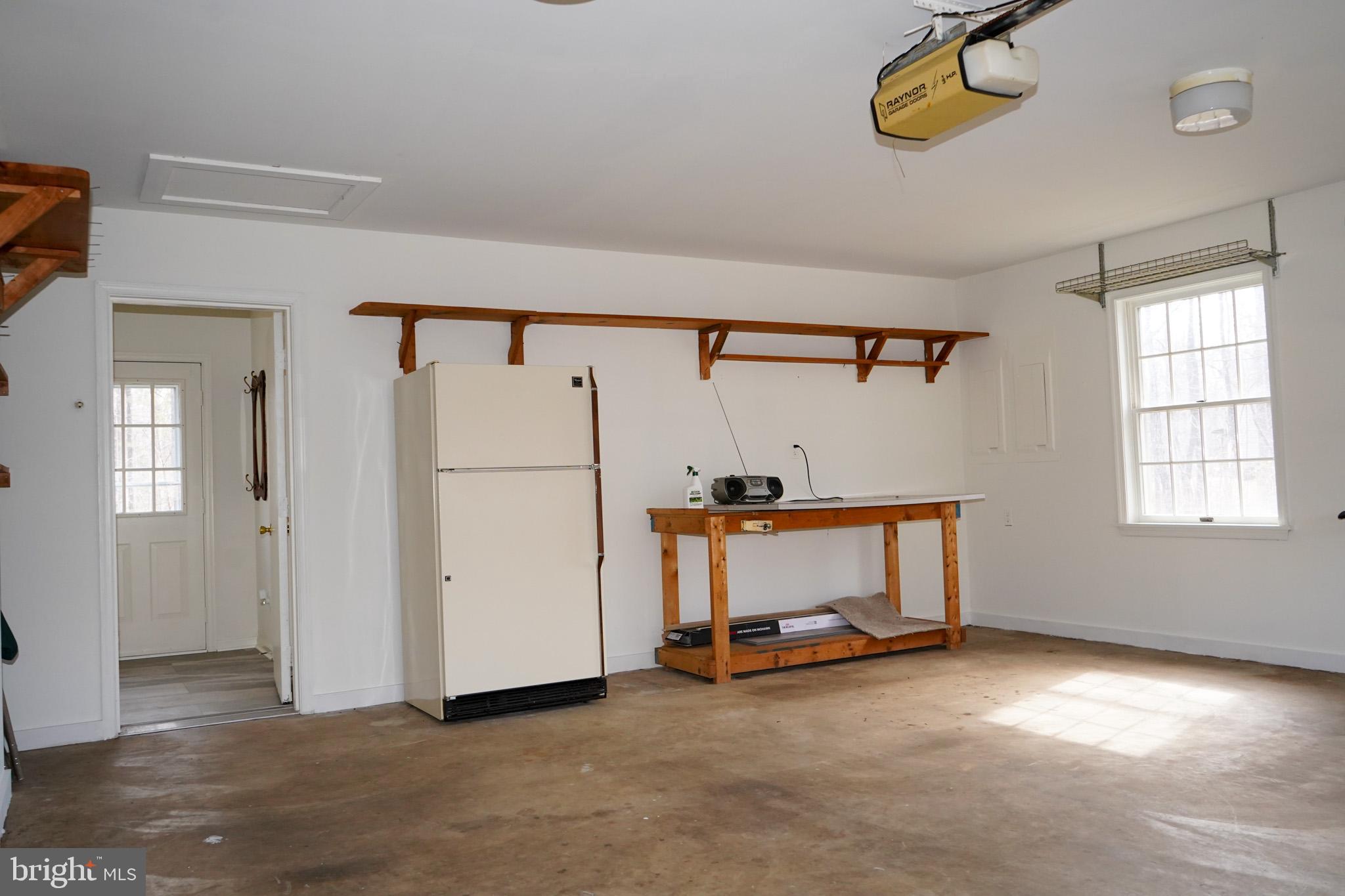 7323 O'Keefe Road Bealeton, VA 22712 - Photo 16 of 48 Plenty of room in garage with additional Frig