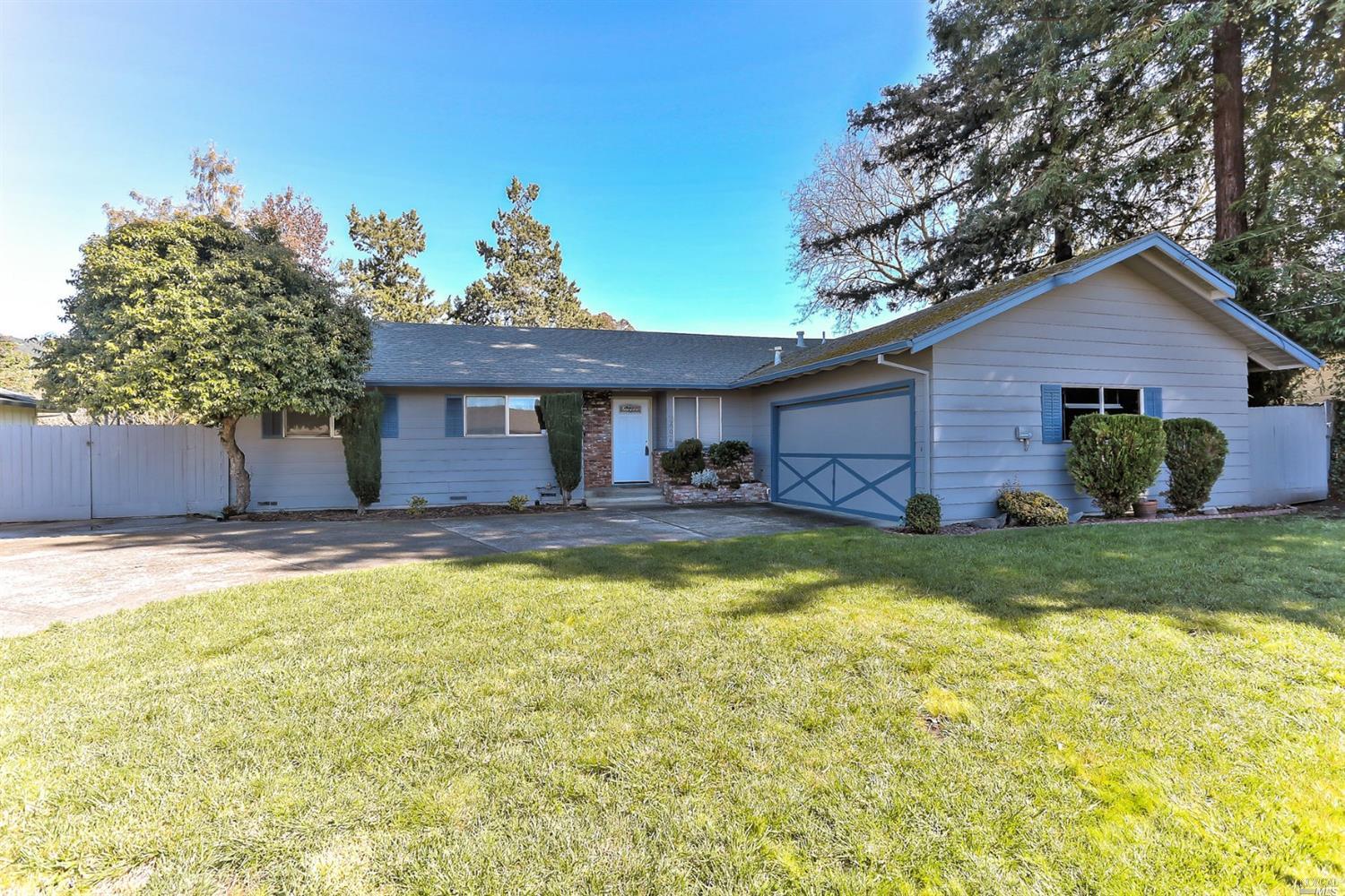 206 Calistoga Road Santa Rosa, CA 95409 - Photo 1 of 1 a view of a house with swimming pool and a yard
