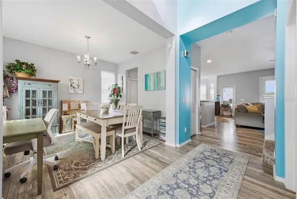 a view of a dining room with furniture