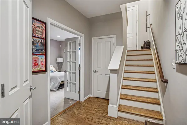 a bedroom with a bed and a table