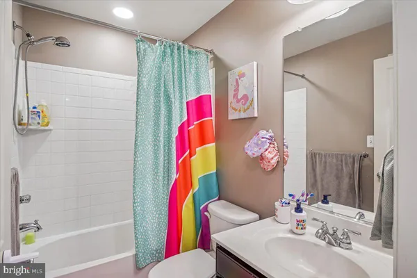 a utility room with sink dryer and washer