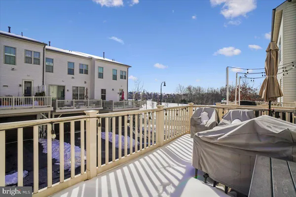 a view of a balcony with a patio