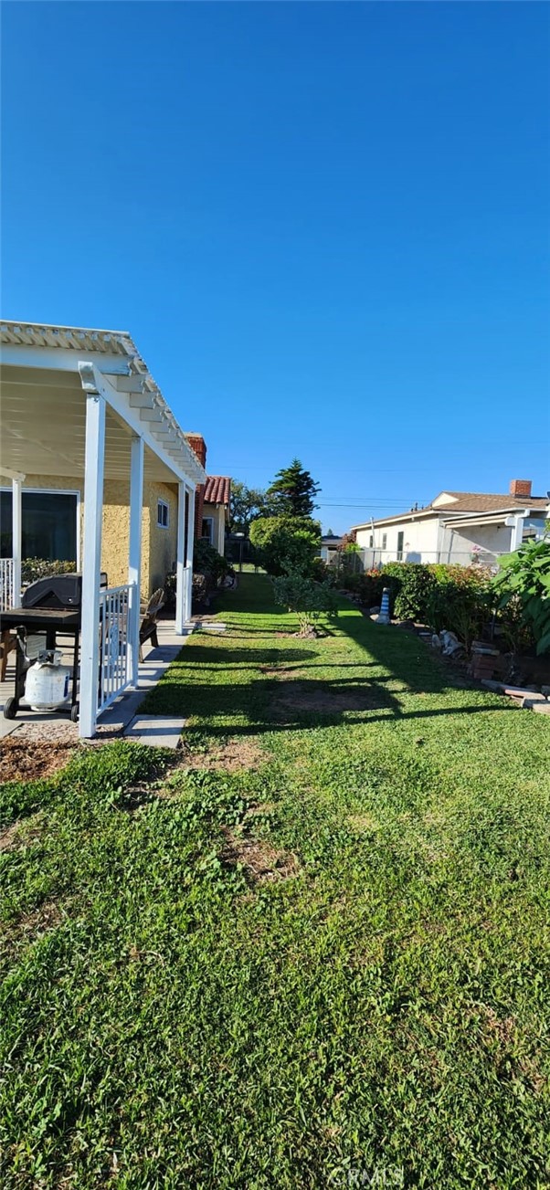 520 West Raymond Street Compton, CA 90220 - Photo 16 of 31 a view of a house with a big yard