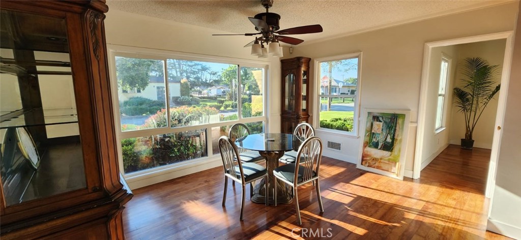 520 West Raymond Street Compton, CA 90220 - Photo 25 of 31 a view of a dining room with furniture window and wooden floor