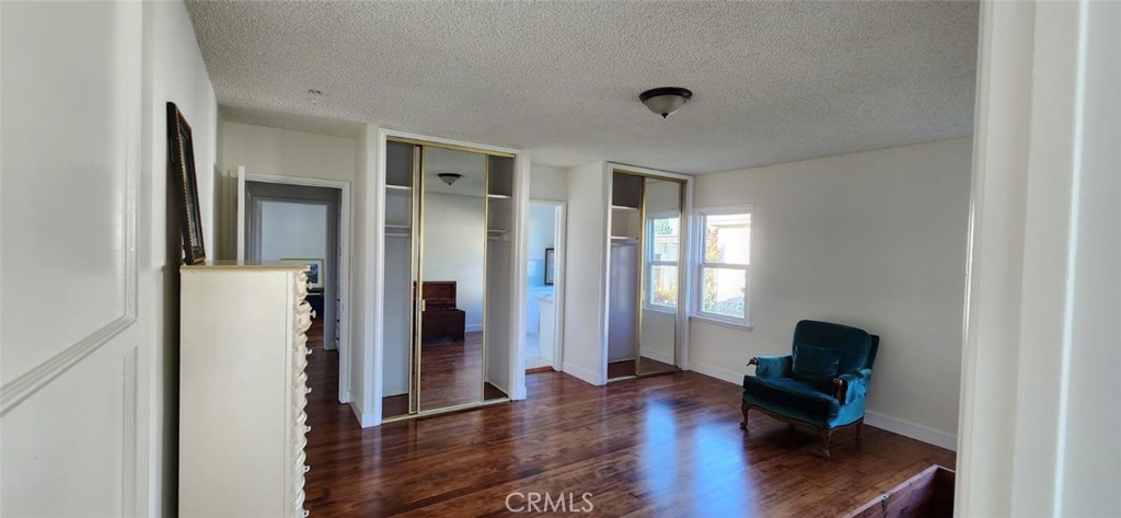 520 West Raymond Street Compton, CA 90220 - Photo 27 of 31 a living room with furniture and a window