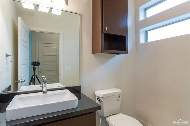 a bathroom with a sink and a toilet