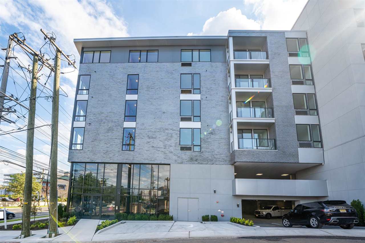 8621 River Road, Unit 6D North Bergen, NJ 07047 - Photo 33 of 34 a front view of a building with a street