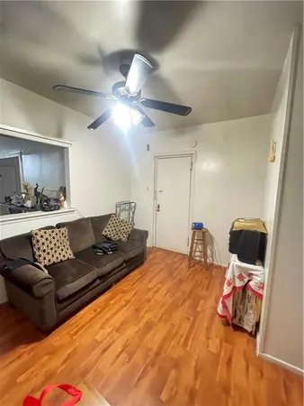 a bedroom with a bed and couch