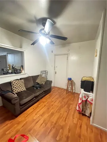 a bedroom with a bed and couch