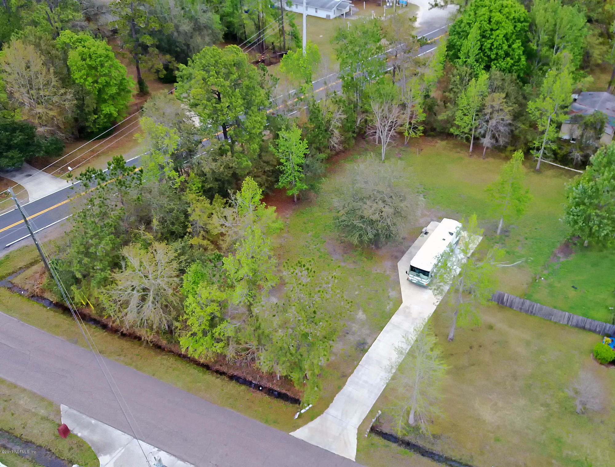Lot Yellow Yellow Bluff Road Jacksonville, FL 32226 - Photo 14 of 16 a view of a lake with a yard