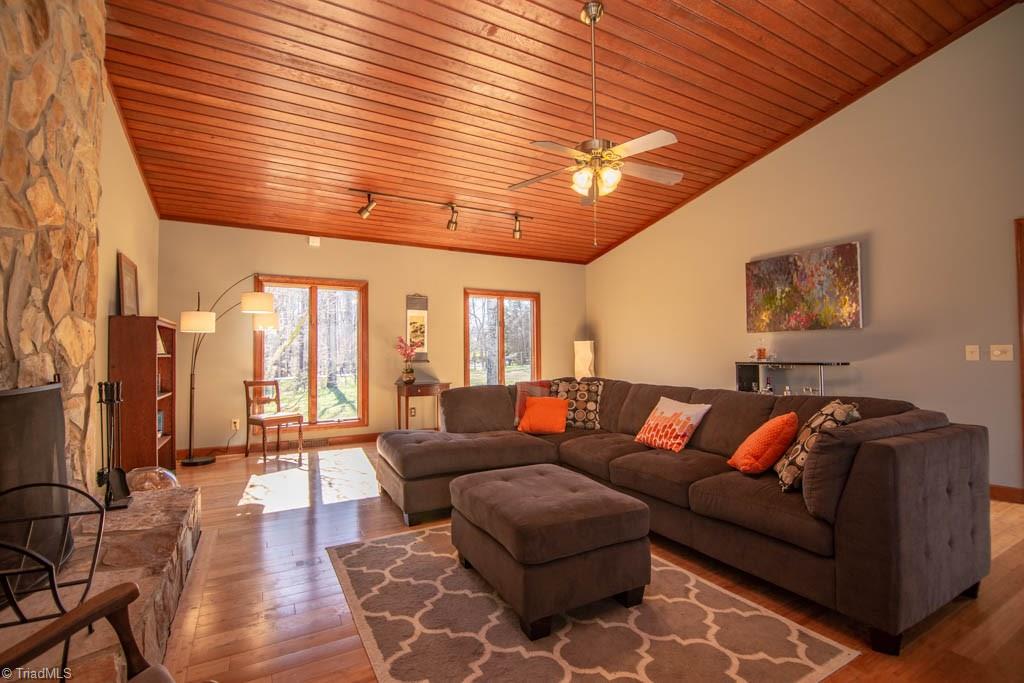 6520 Hollow River Drive Oak Ridge, NC 27310 - Photo 8 of 26 Great room with bamboo flooring and views to the front yard.