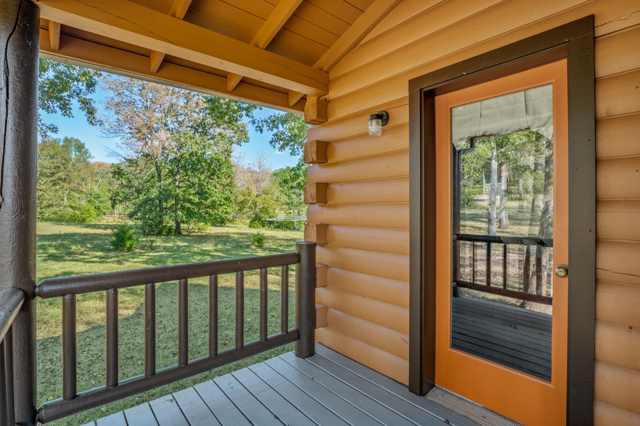 5285 Simmons Bluff Road Lebanon, TN 37090 - Photo 18 of 32 a view of a balcony with wooden floor