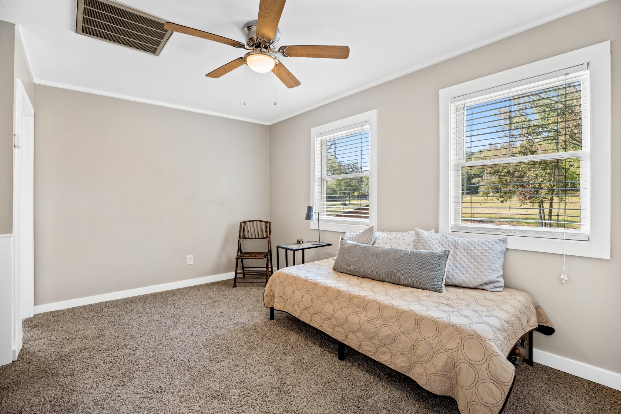 5285 Simmons Bluff Road Lebanon, TN 37090 - Photo 19 of 32 a bedroom with a bed and a window