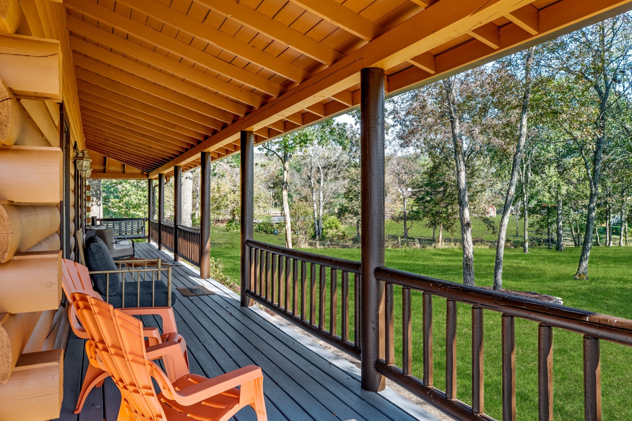 5285 Simmons Bluff Road Lebanon, TN 37090 - Photo 3 of 32 a view of balcony with wooden floor and outdoor seating