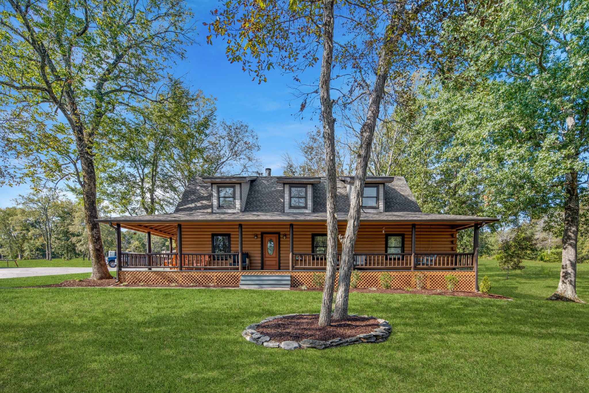 5285 Simmons Bluff Road Lebanon, TN 37090 - Photo 31 of 32 a front view of a house with a garden