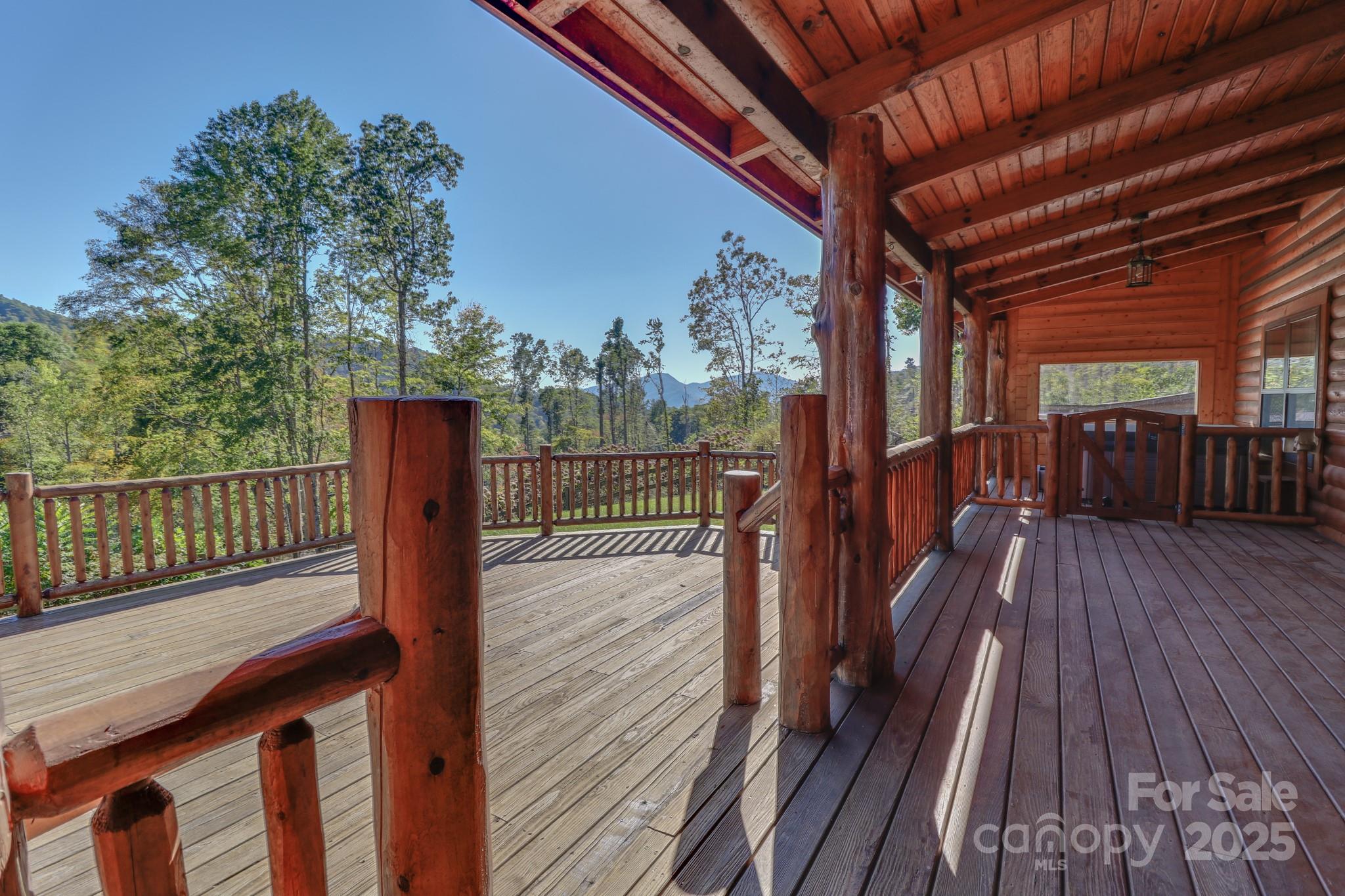a view of balcony with wooden floor