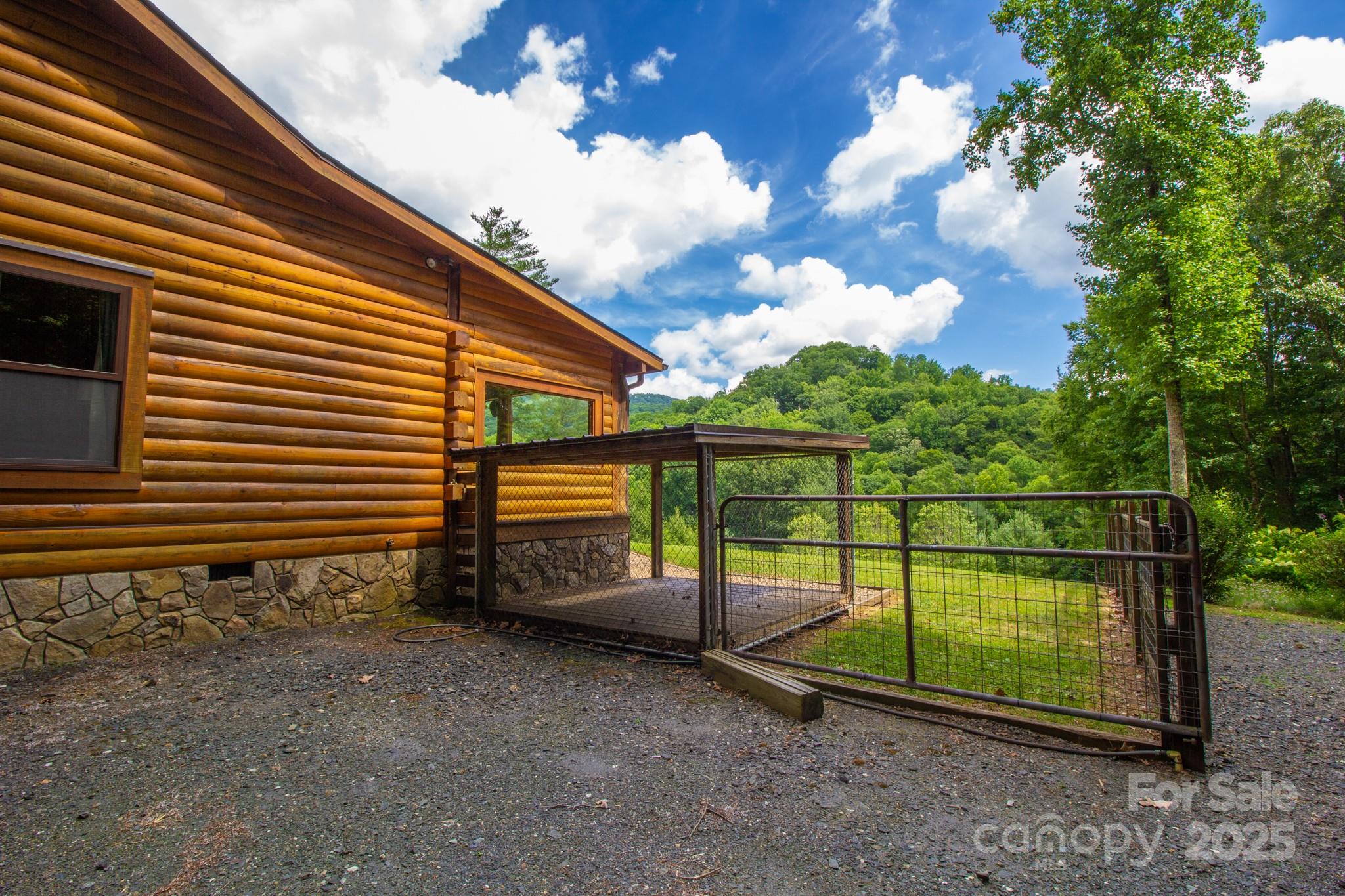 2811 Poplar Creek Road Green Mountain, NC 28740 - Photo 29 of 35 a view of a backyard