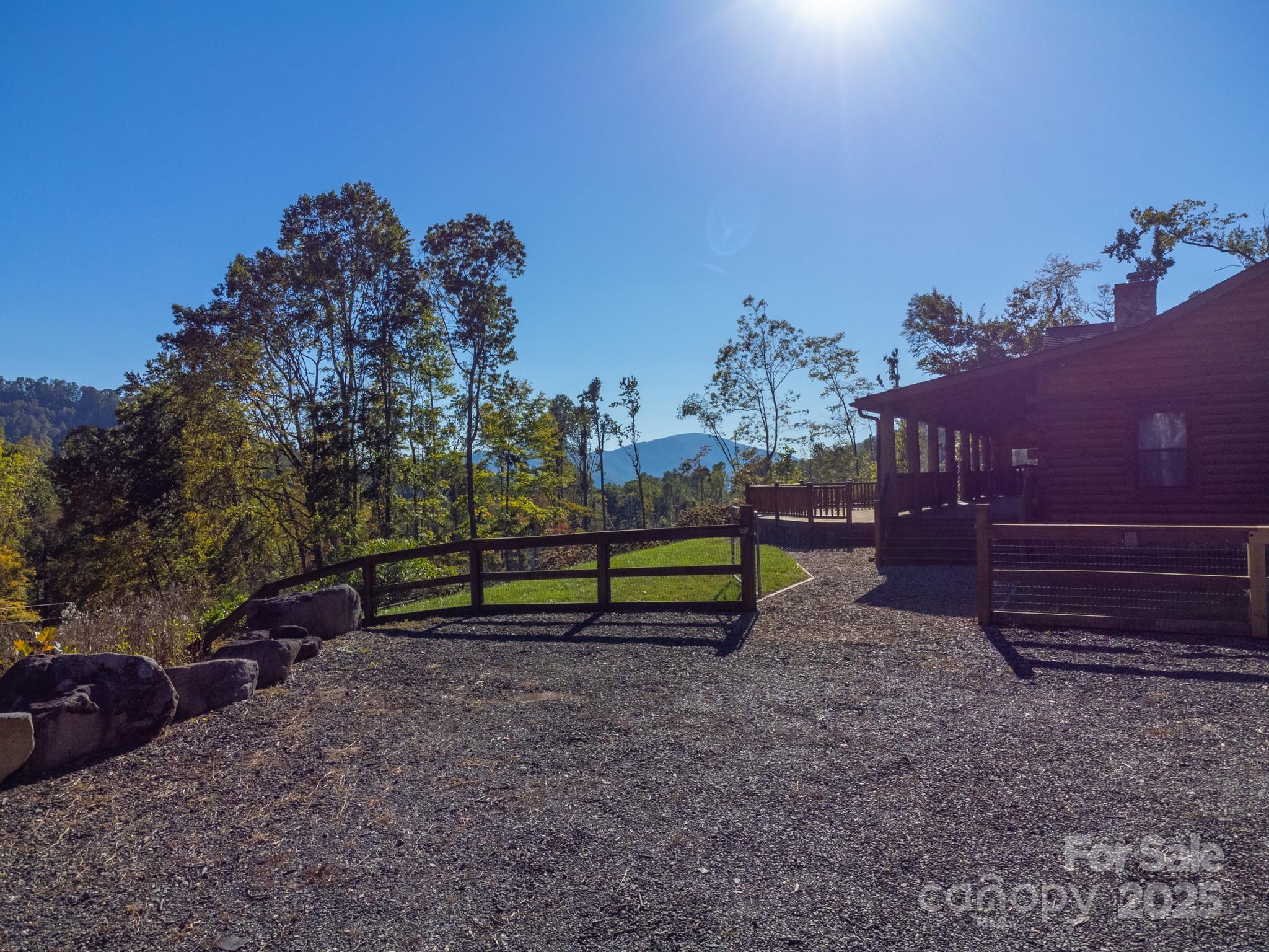 2811 Poplar Creek Road Green Mountain, NC 28740 - Photo 35 of 35 a view of a bench in a backyard