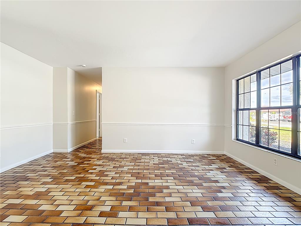 7286 Jonas Road Fort Myers, FL 33967 - Photo 12 of 81 a view of an empty room and window