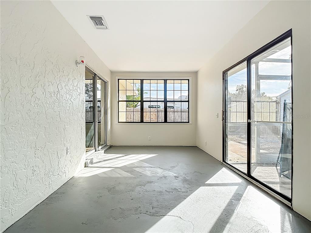 7286 Jonas Road Fort Myers, FL 33967 - Photo 26 of 81 an empty room with windows