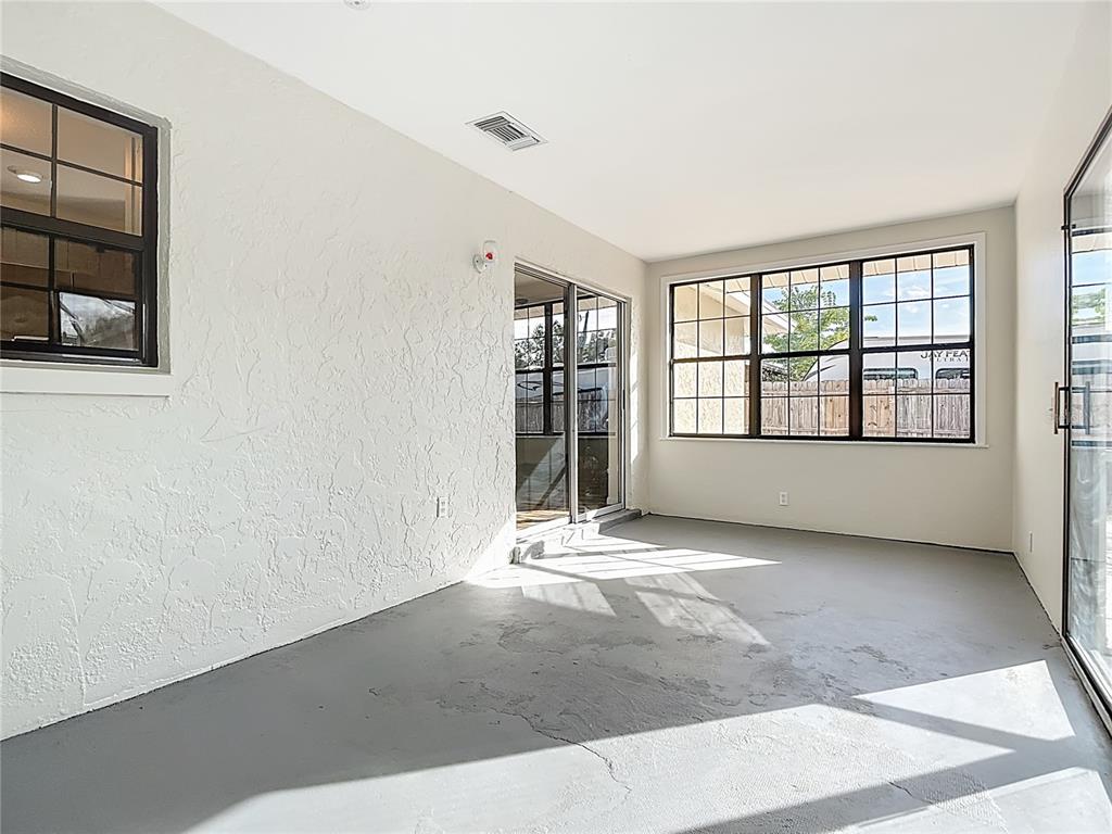 7286 Jonas Road Fort Myers, FL 33967 - Photo 27 of 81 an empty room with windows