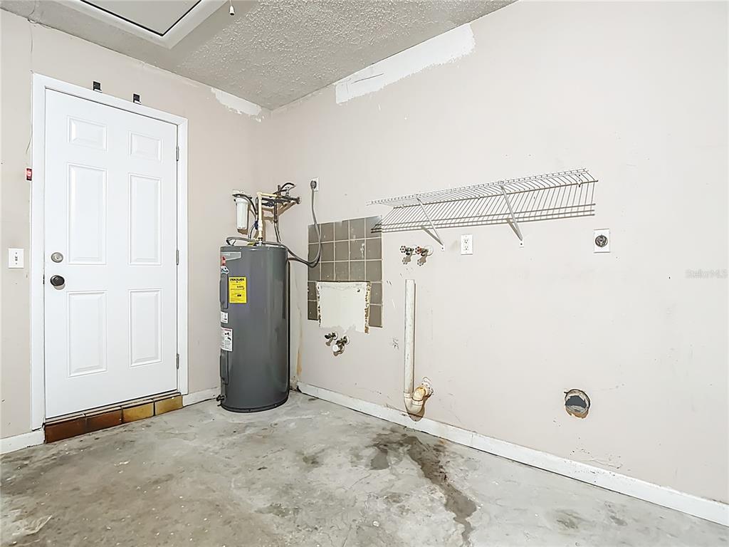 7286 Jonas Road Fort Myers, FL 33967 - Photo 33 of 81 a view of a storage & utility room with a window
