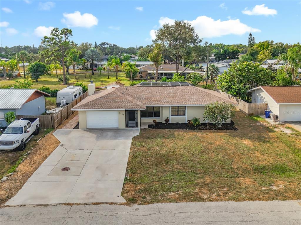 7286 Jonas Road Fort Myers, FL 33967 - Photo 59 of 81 a aerial view of a house with swimming pool garden view and lake view