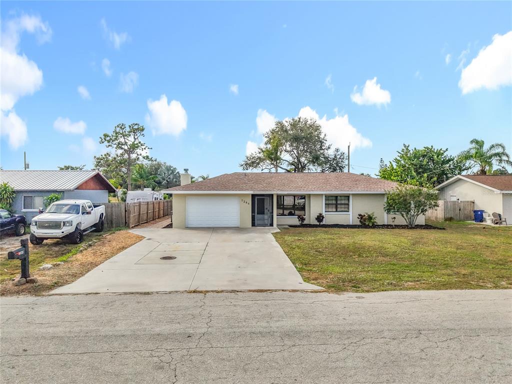 7286 Jonas Road Fort Myers, FL 33967 - Photo 6 of 81 a front view of a house with garden