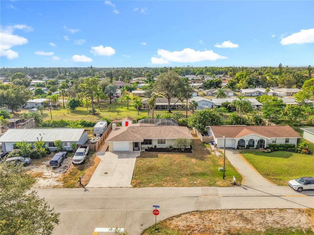 7286 Jonas Road Fort Myers, FL 33967 - Photo 62 of 81 an aerial view of residential houses with outdoor space and ocean view
