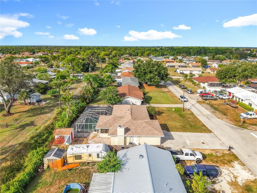 7286 Jonas Road Fort Myers, FL 33967 - Photo 77 of 81 an aerial view of residential houses with outdoor space