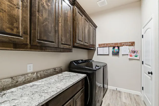 a view of a storage and utility room in a kitchen