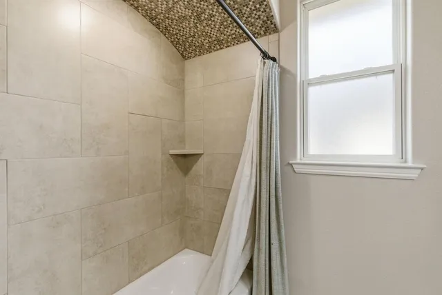 a bathroom with a bathtub