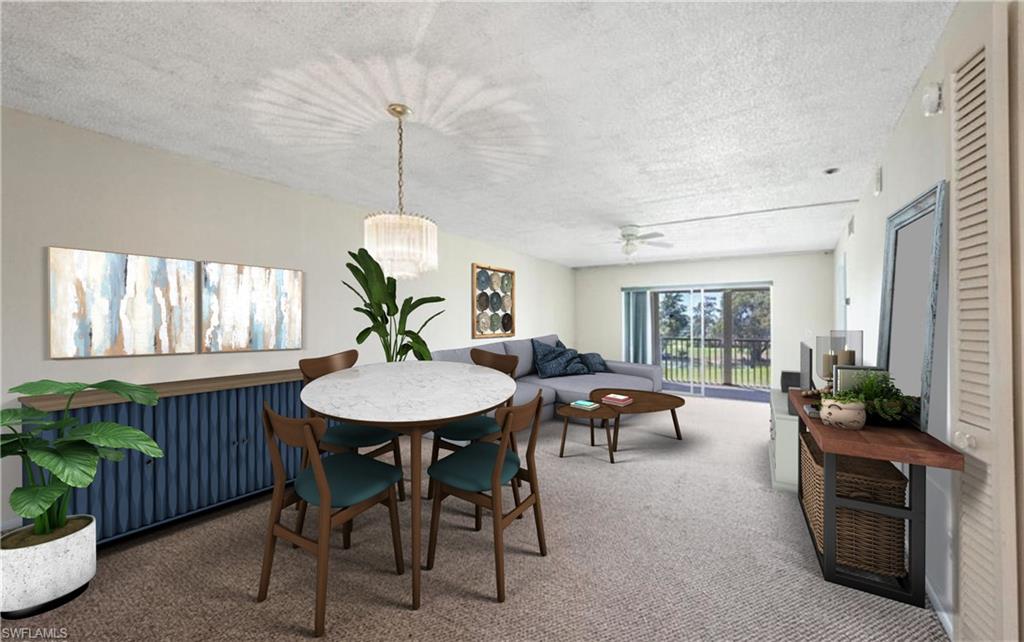 5635 Rattlesnake Hammock Road, Unit D203 Naples, FL 34113 - Photo 2 of 8 a living room with furniture a window and a table