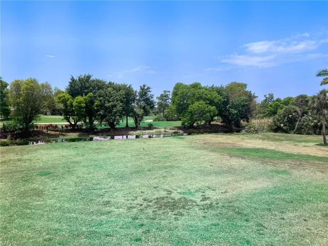 a view of outdoor space with deck and yard