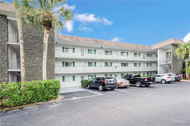a cars parked in front of a building