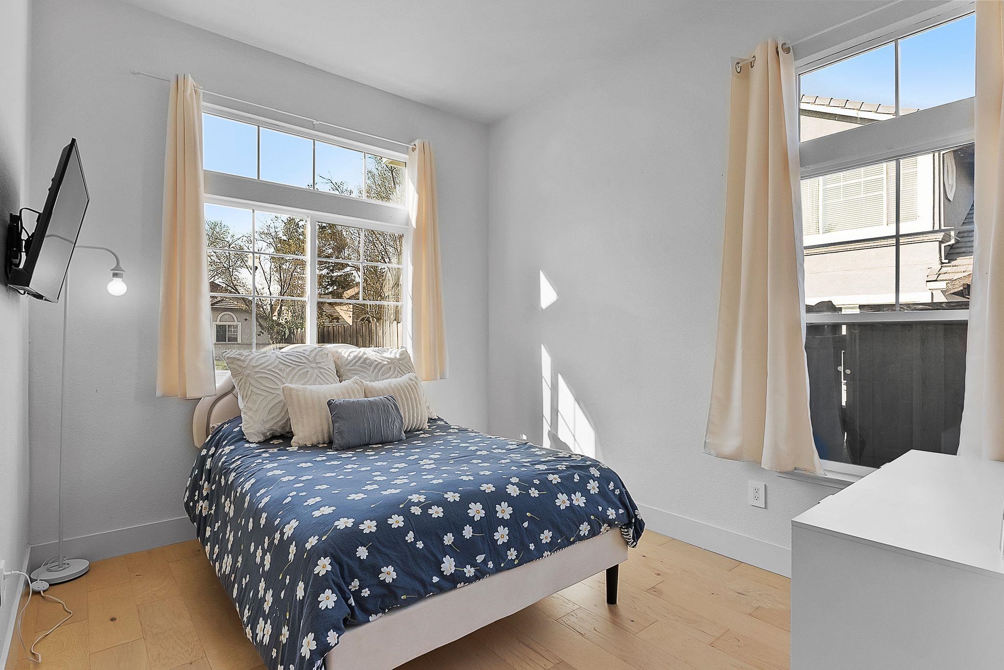 536 Birchwood Road Brentwood, CA 94513 - Photo 24 of 45 Bedroom with baseboards and light wood-type flooring