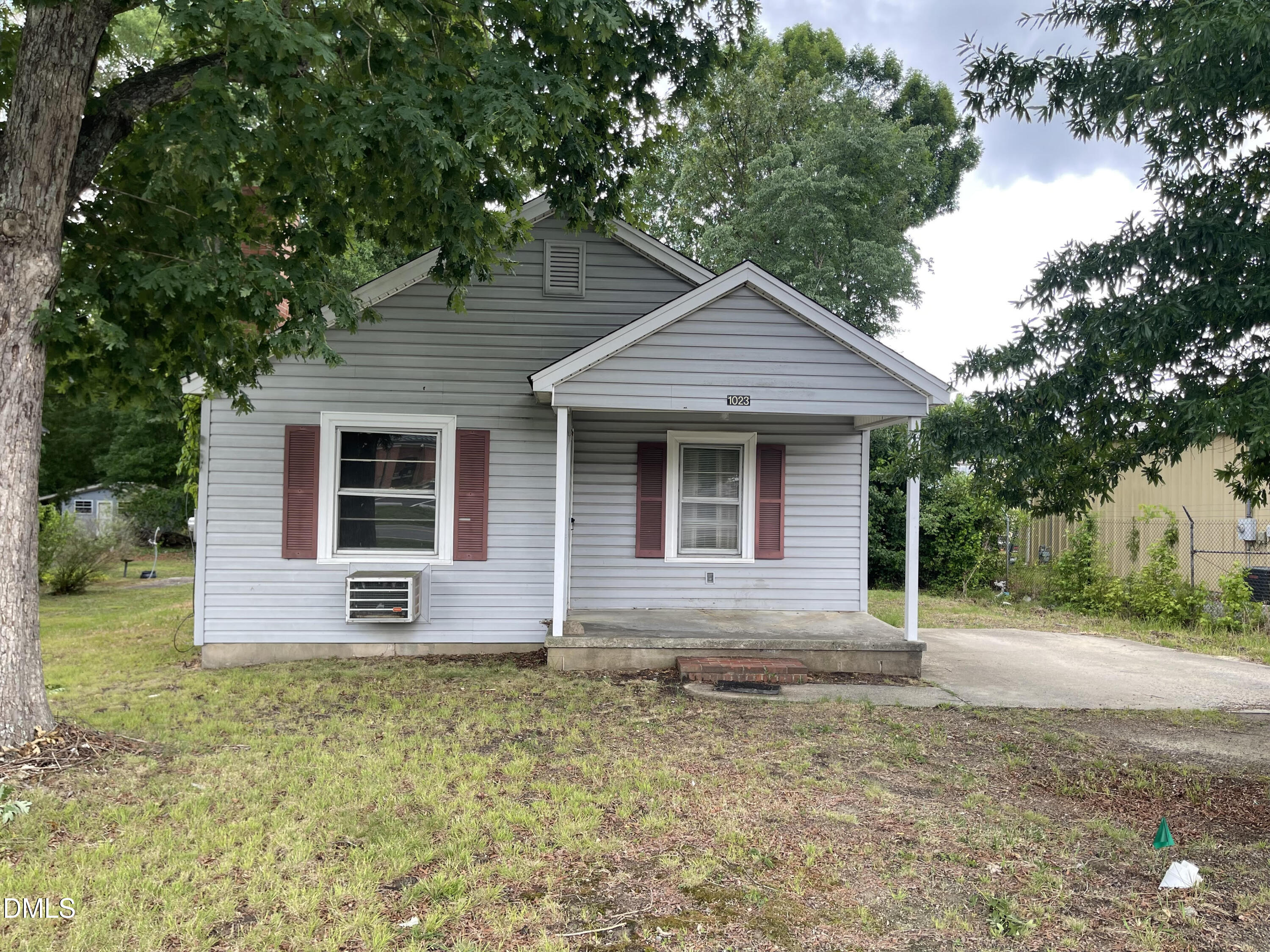 1023 Leasburg Road Roxboro, NC 27573 - Photo 1 of 12 a front view of house with yard
