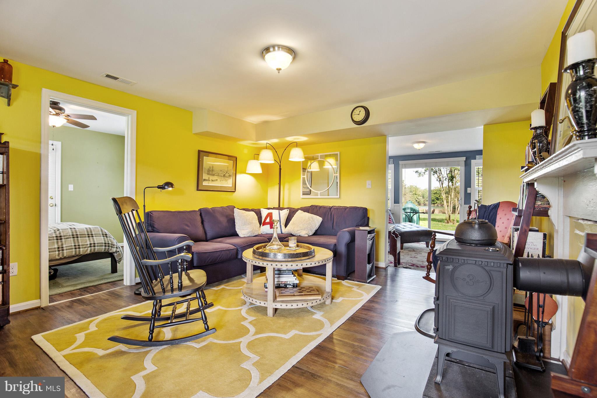48826 Fox Harbor Road Ridge, MD 20680 - Photo 3 of 27 Living room with wood stove