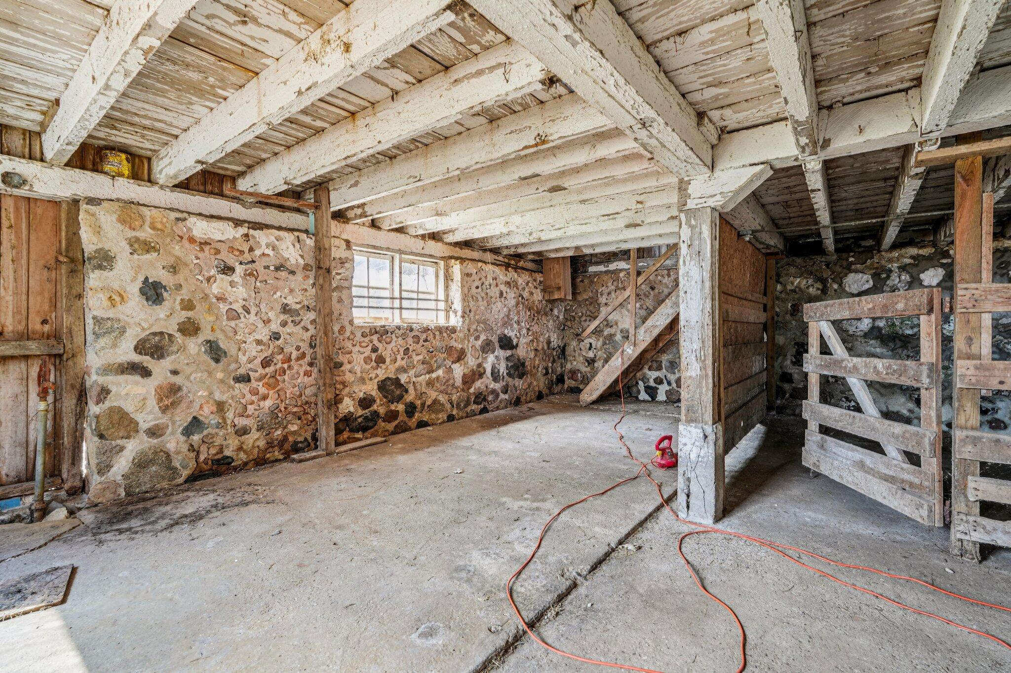 W4669 County Rd A Lafayette, WI 53121 - Photo 44 of 66 well-maintained stone foundation