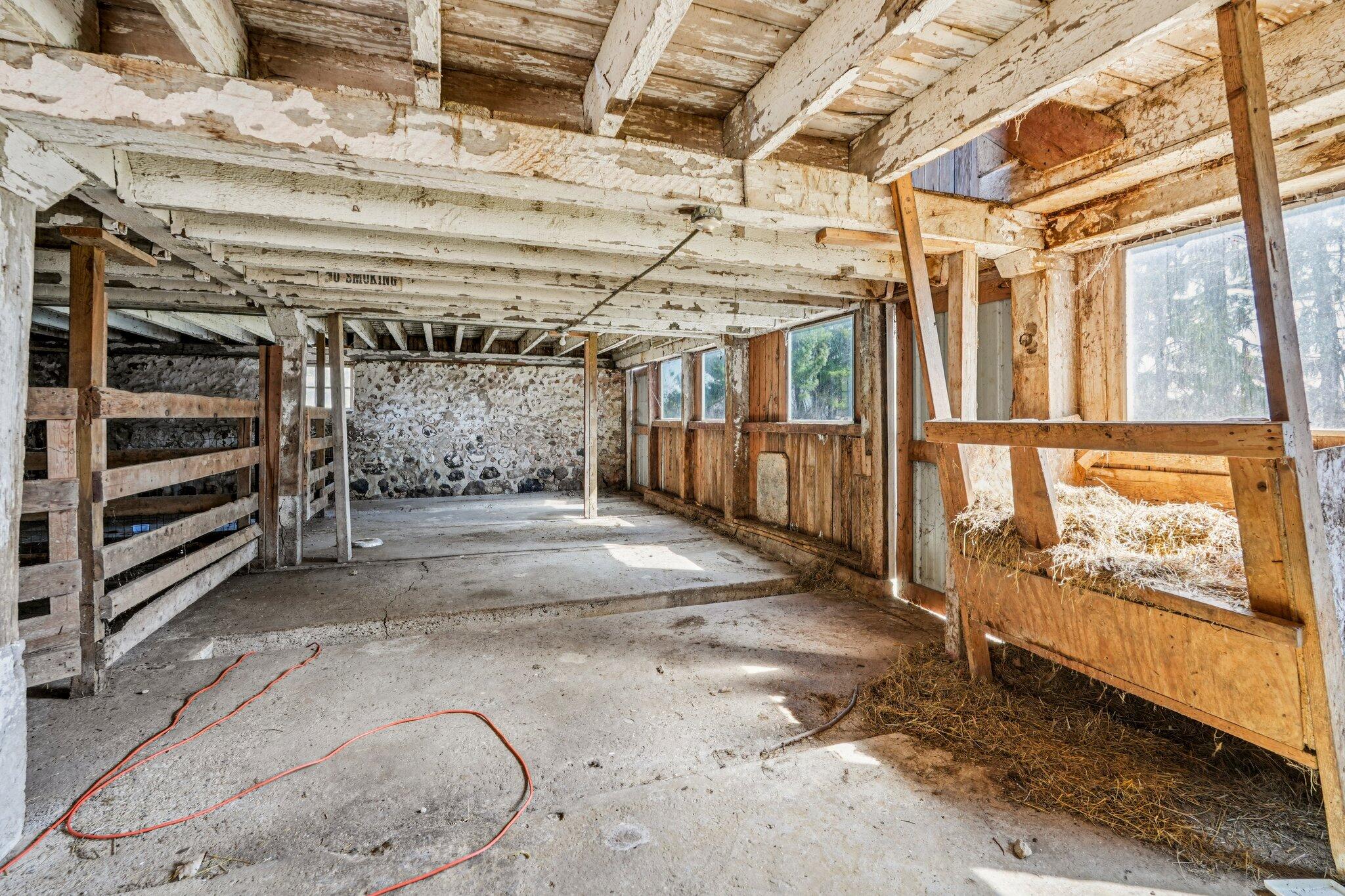W4669 County Rd A Lafayette, WI 53121 - Photo 45 of 66 two stalls down here and the floor is concrete