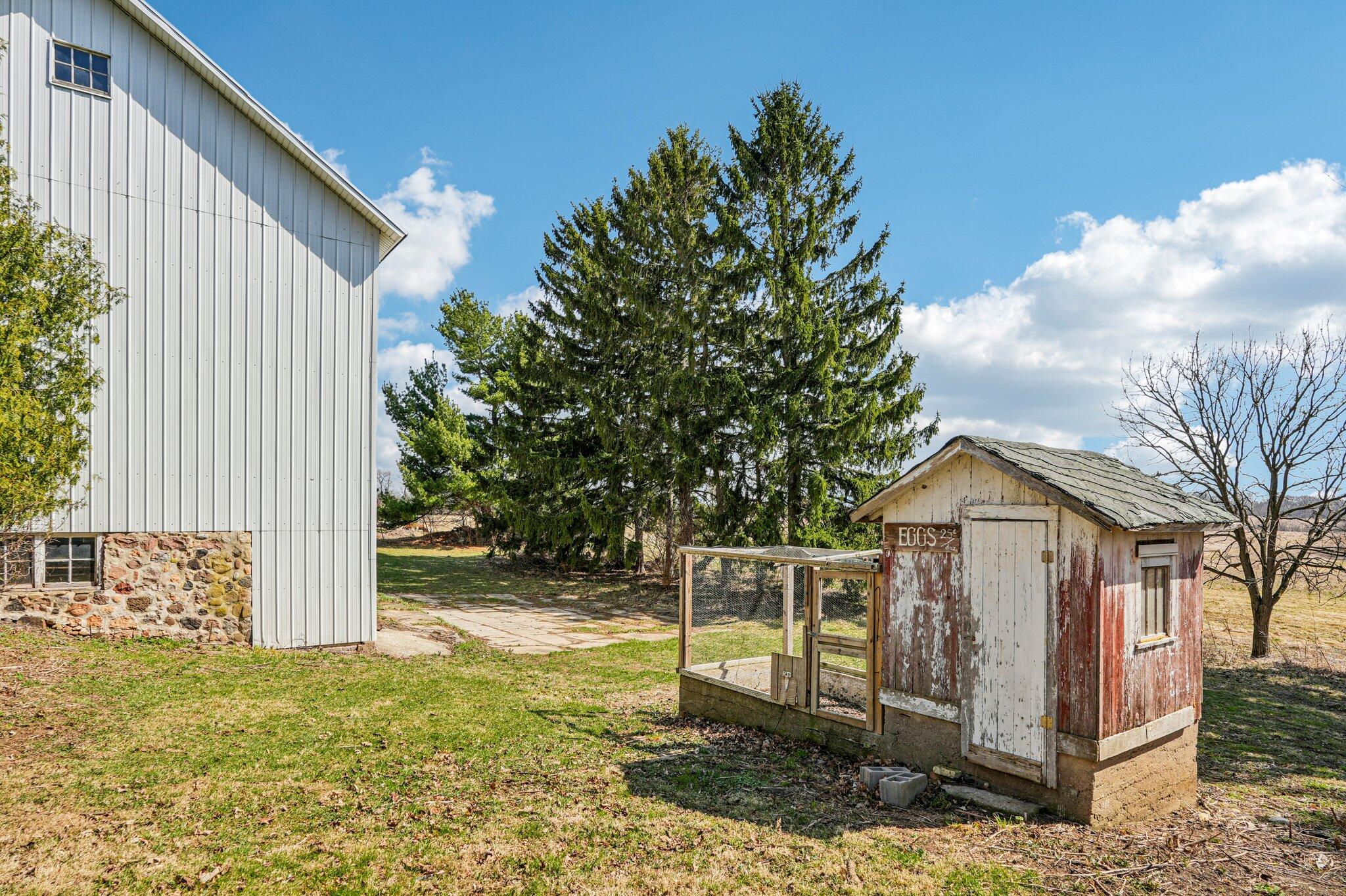 W4669 County Rd A Lafayette, WI 53121 - Photo 47 of 66 view of coop and barn