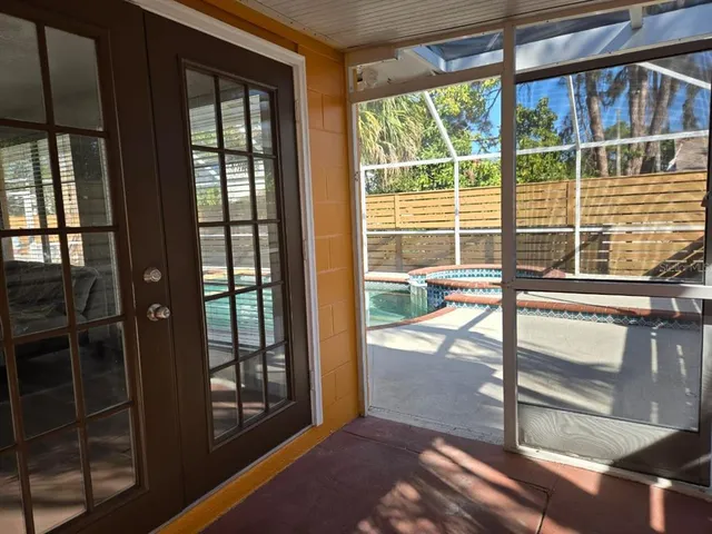 a view of a living room with a fireplace