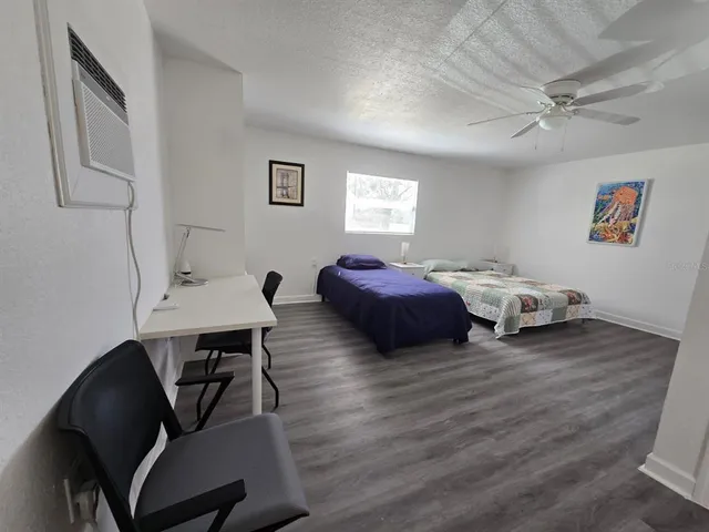 a bathroom with a shower and a toilet