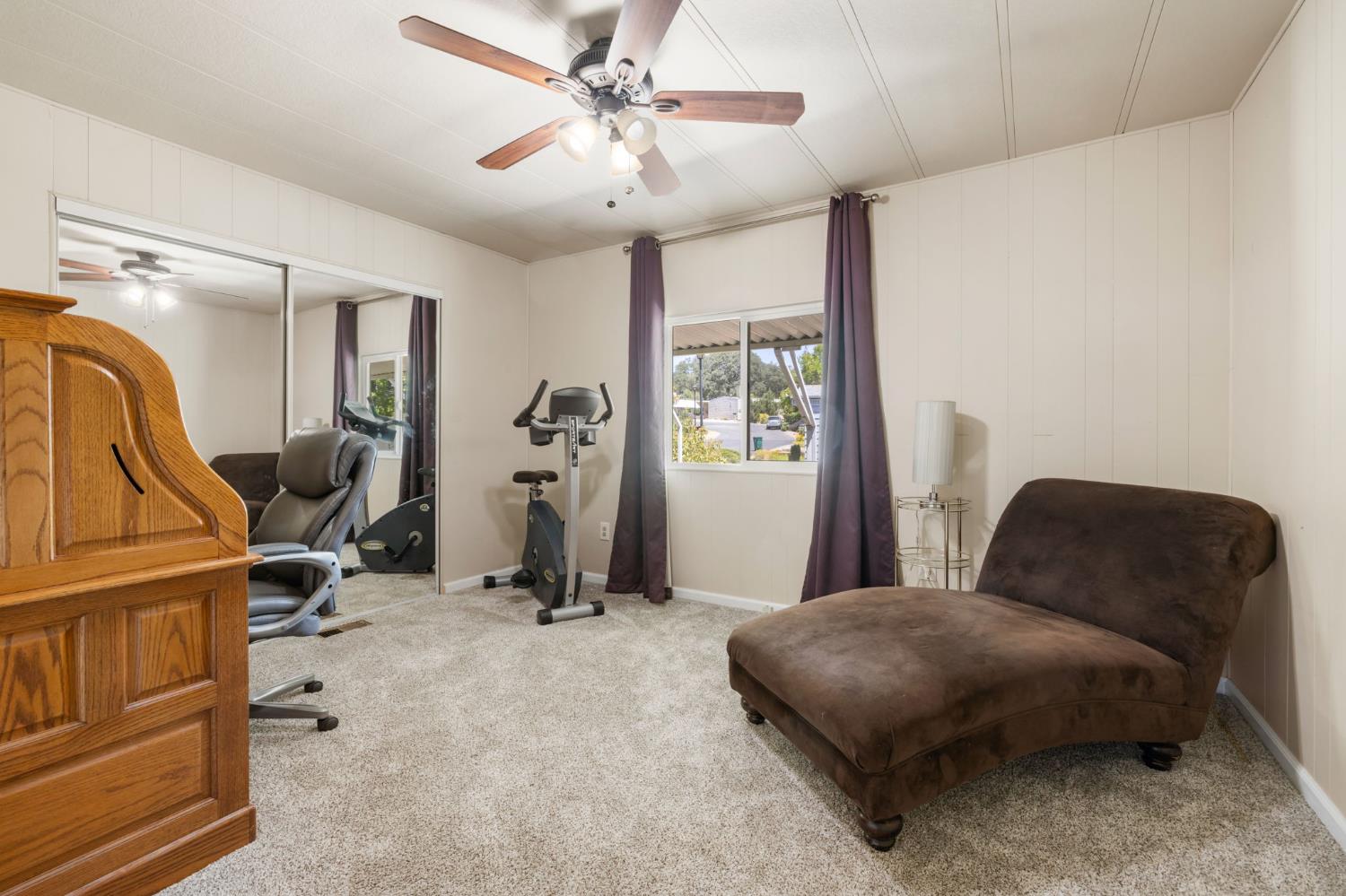 4700 Old French Town Road, Unit 64 Shingle Springs, CA 95682 - Photo 16 of 26 a bedroom with furniture and a window