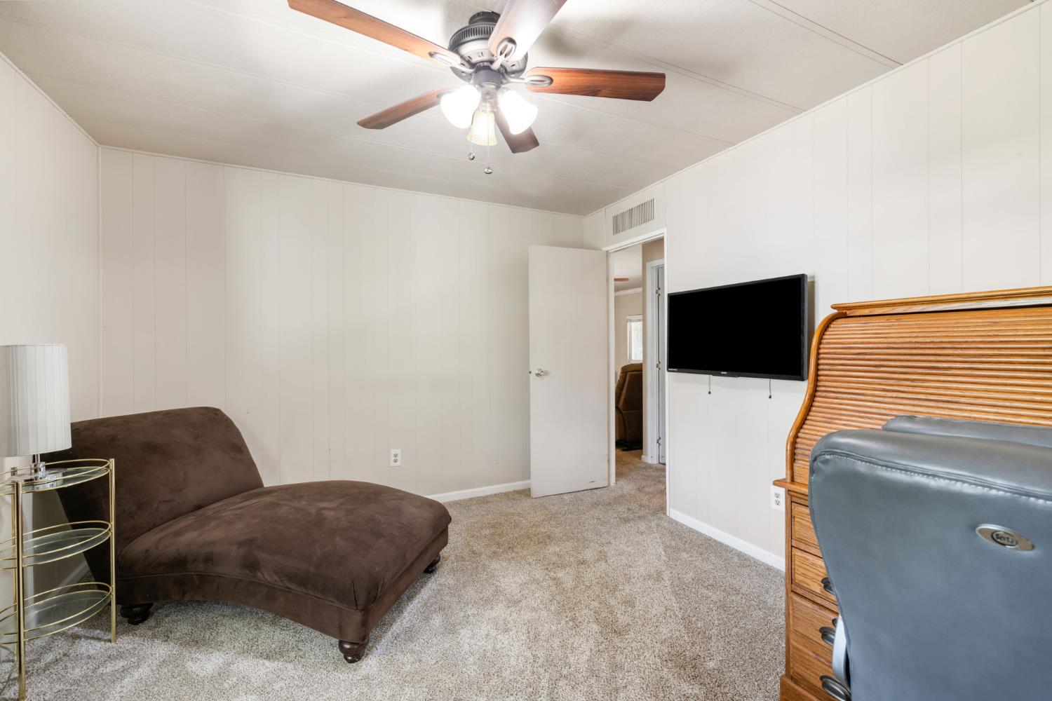 4700 Old French Town Road, Unit 64 Shingle Springs, CA 95682 - Photo 17 of 26 a living room with furniture and a flat screen tv