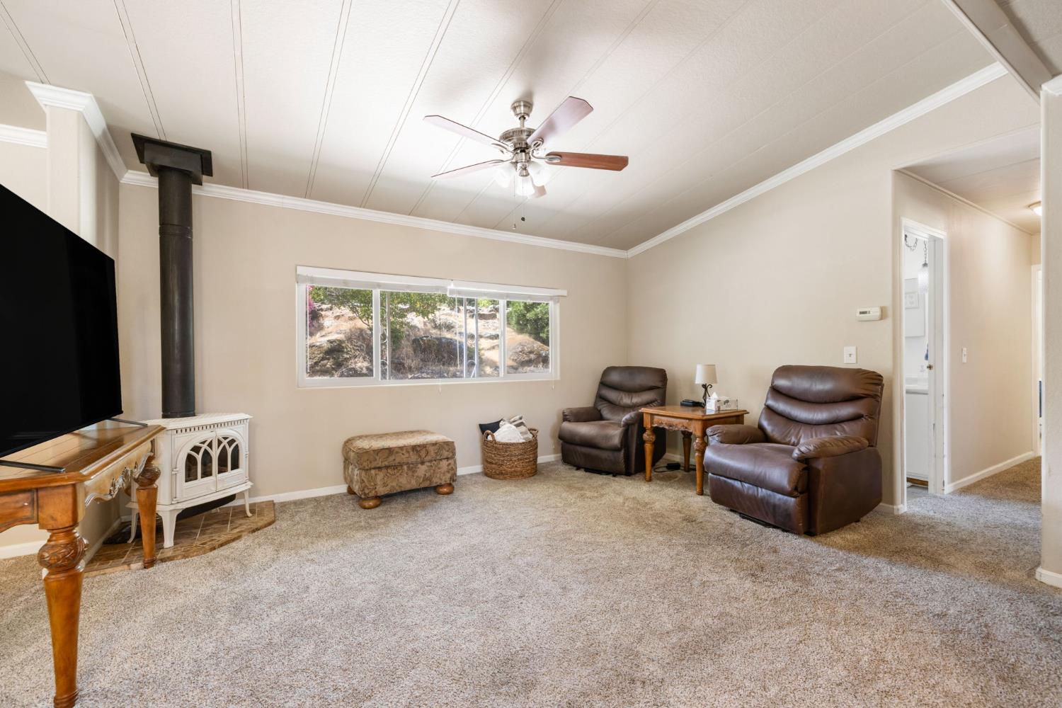 4700 Old French Town Road, Unit 64 Shingle Springs, CA 95682 - Photo 21 of 26 a living room with furniture and a flat screen tv