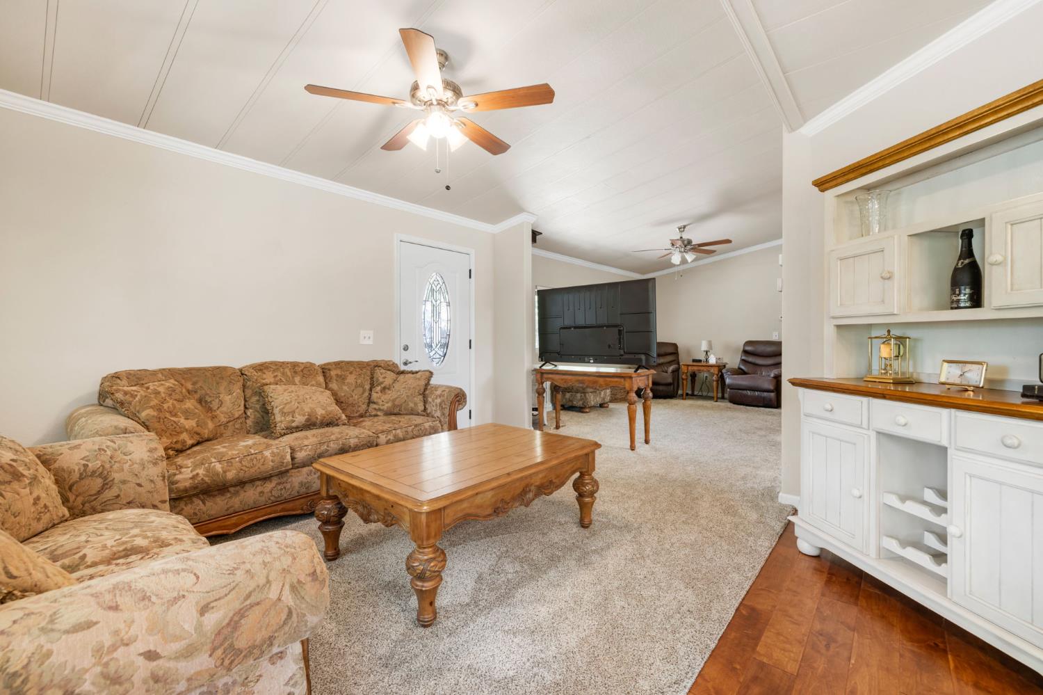 4700 Old French Town Road, Unit 64 Shingle Springs, CA 95682 - Photo 7 of 26 a living room with furniture and kitchen view
