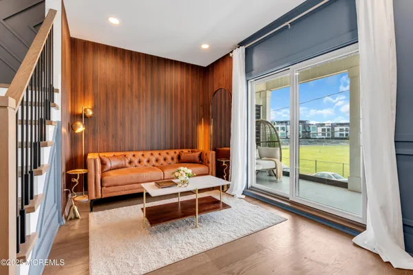a view of livingroom with furniture and stairs