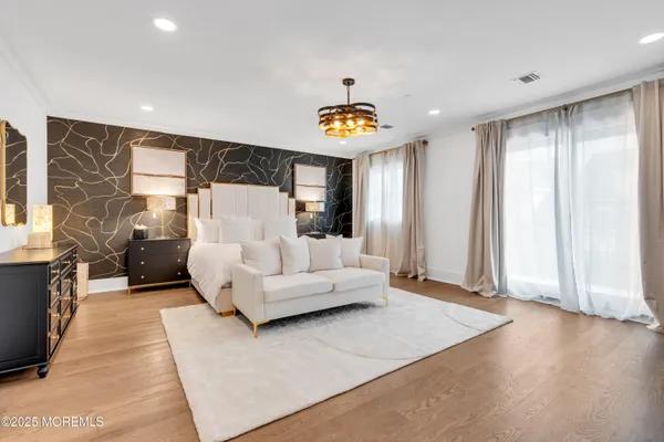 a bathroom with a bathtub and a sink