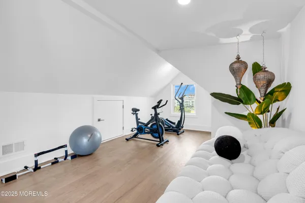 a view of swimming pool with outdoor seating and yard in back